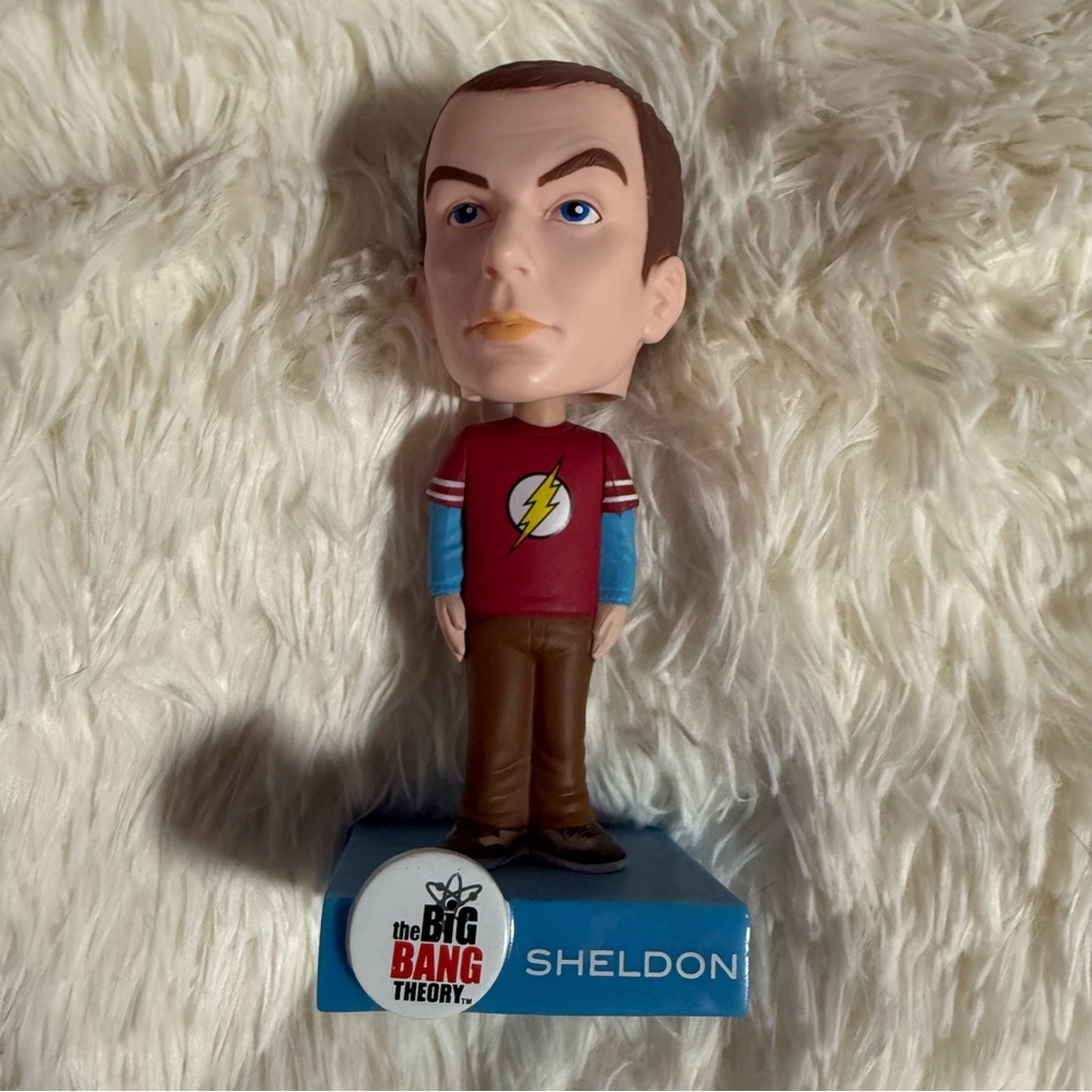 Funko Sheldon Figure with Red and Blue Outfit